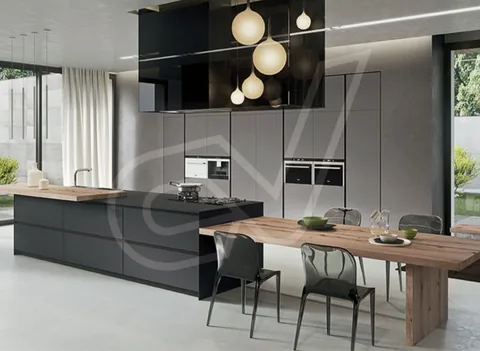 Cocina en tono grafito con isla y mesa integrada