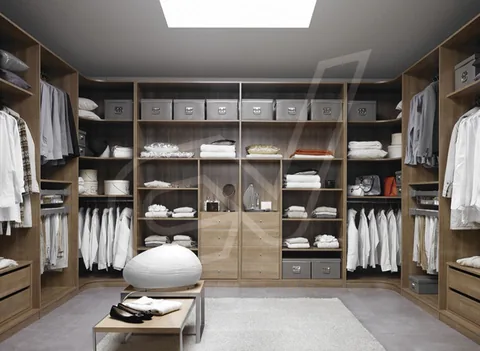 Vestidor de madera con módulos abiertos y banqueta central